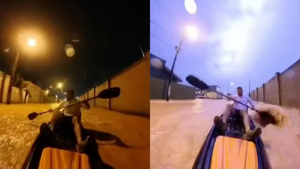 Morador navega de caiaque em rua alagada de Vilhena